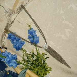 Robert Rose necklace.